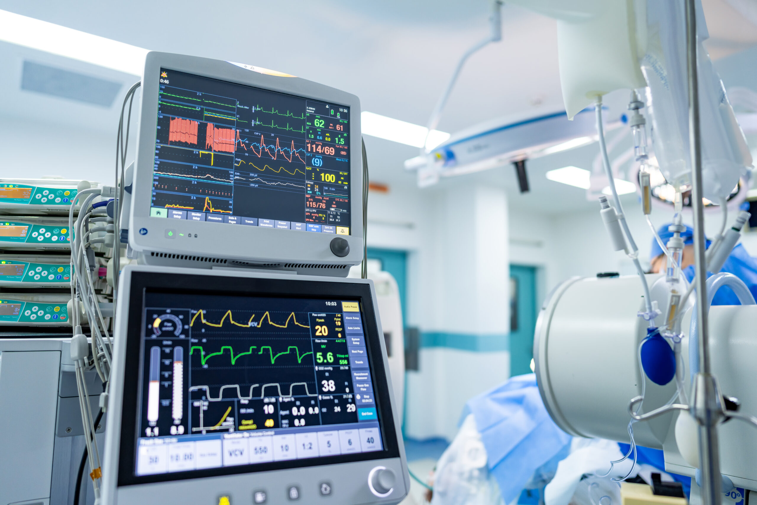 OR surgical monitoring gear. Advanced medical equipment displays vital signs and patients’ data in a modern hospital operating room environment. Advanced medical equipment displays vital signs and patients' data in a modern hospital operating room environment.